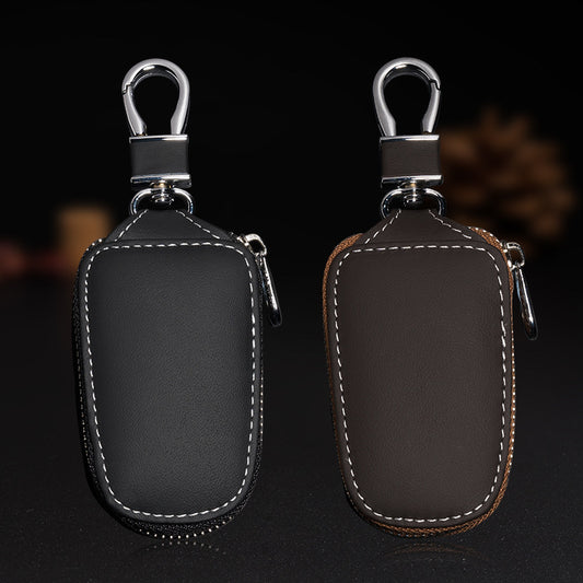 Cowhide leather zip cover for smart car keys – black and brown pouches side by side with keyring clips