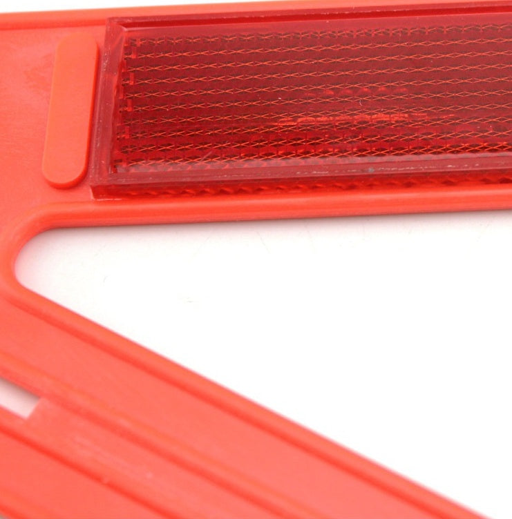 Warning triangle – foldable, reflective – close-up of the reflective strip and hinge