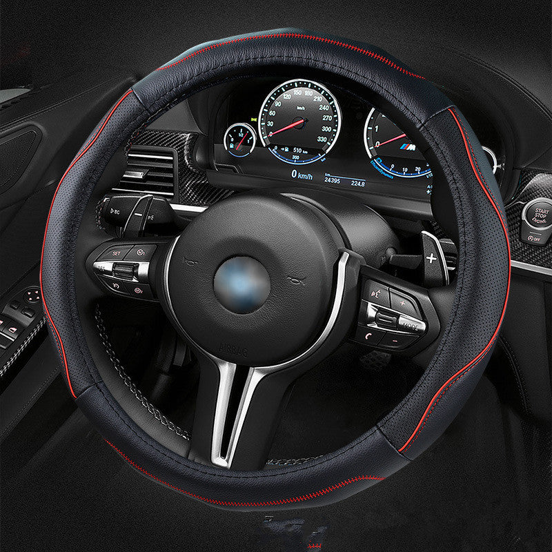 Soft-grip steering wheel cover, 36cm or 38cm – black cover with red stitching on a BMW steering wheel