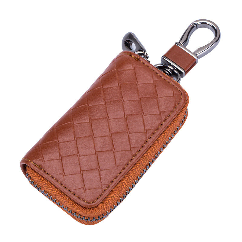 Woven leather car key holder – tan version with metal clasp on white background