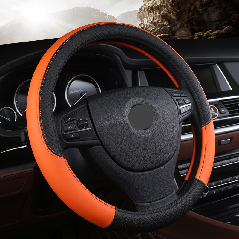 Leather-look steering wheel cover, 38cm – fitted on car steering wheel in orange and black