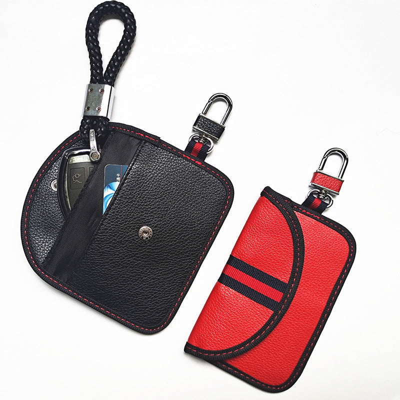 RFID signal-blocking car key case – leather or carbon-look – open black case beside closed red case